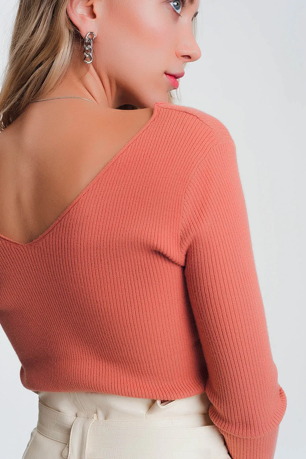 BLUSA DE PUNTO CON ESCOTE DE PICO EN LA ESPALDA ROSA